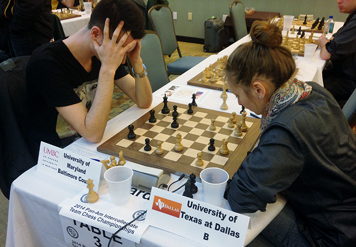 UMBC's GM Niclas “The Dark Knight” Huschenbeth plays GM Nadezhda Kosintseva from UT Dallas in the fifth round of the Pan-Am chess tournament.